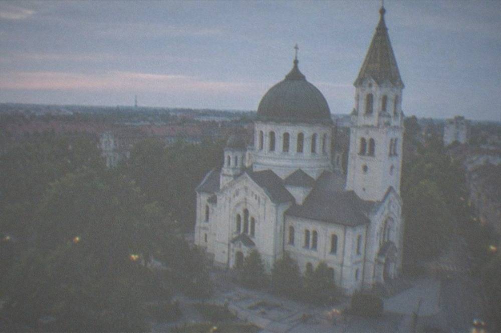 The domed Millennium Church seen from a square in the Iosefin district