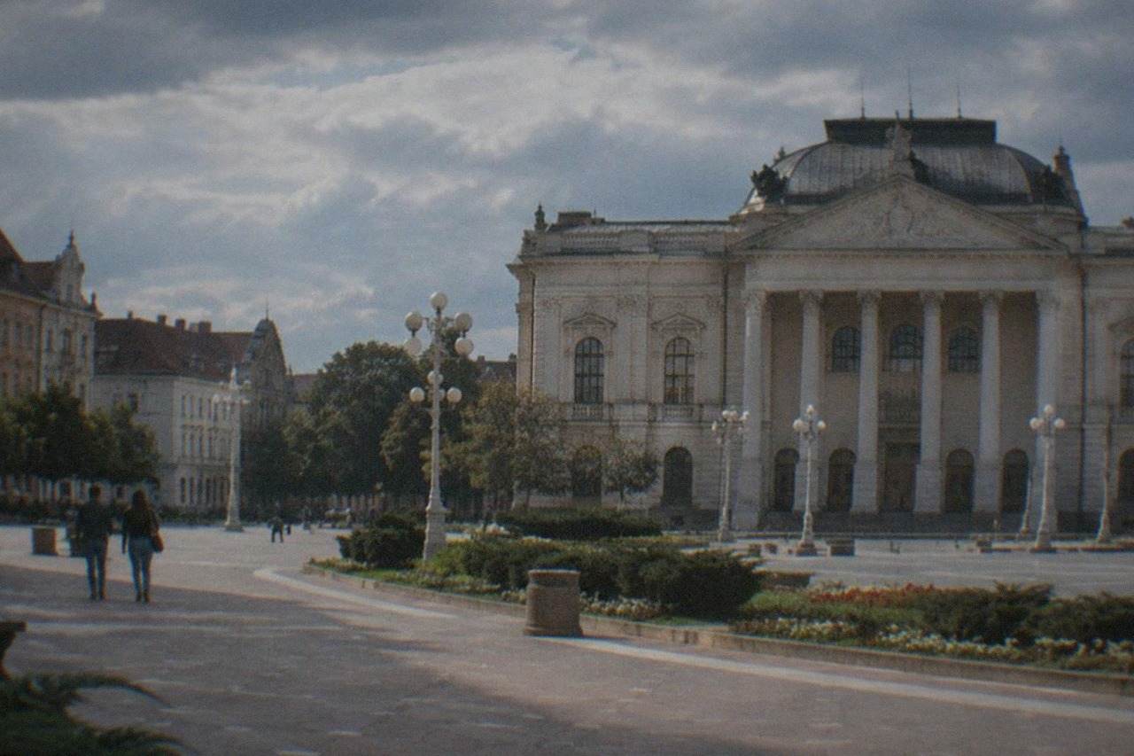 Wide view of Piata Victoriei in Timisoara with the Romanian National Opera building and open square
