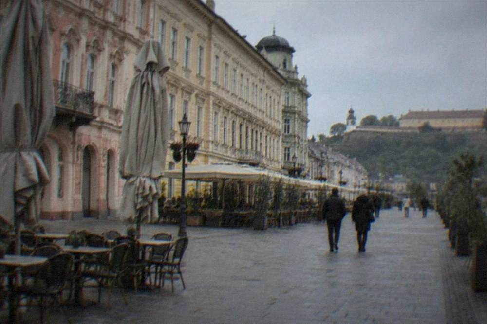 The pedestrian street of Zmaj Jovina in Novi Sad lined with cafe tables