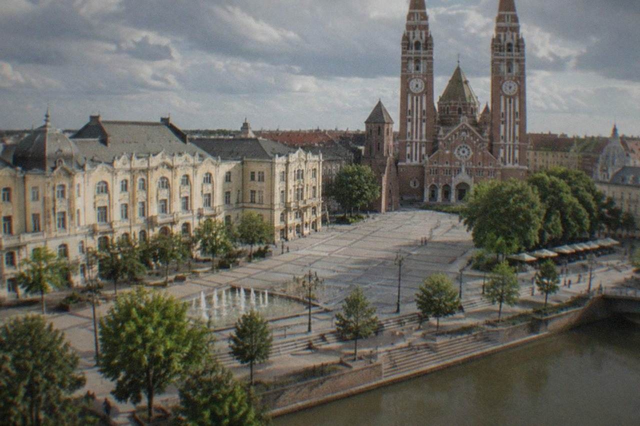 Wide view of Szeged's Dom ter with the Votive Church twin towers rising above the open square