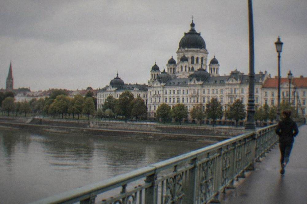 The Tisza river in Szeged seen from a bridge with the city skyline behind