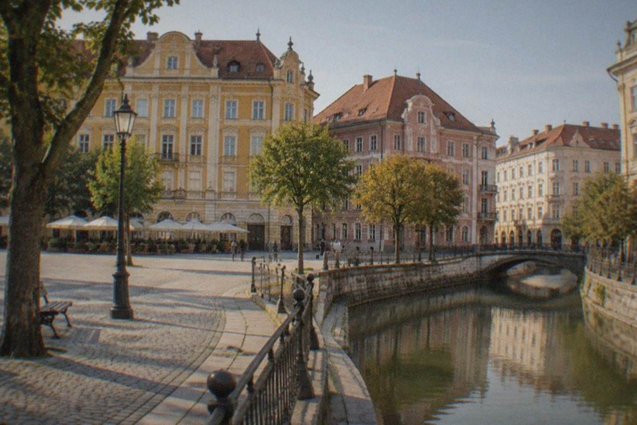Colorful baroque buildings around a square in Timisoara on a sunny afternoon