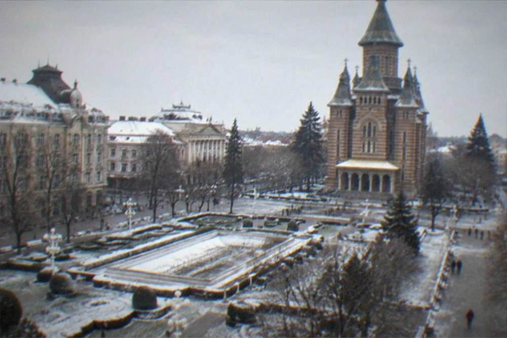 The Metropolitan Orthodox Cathedral and Opera square in Timisoara under winter light with bare trees