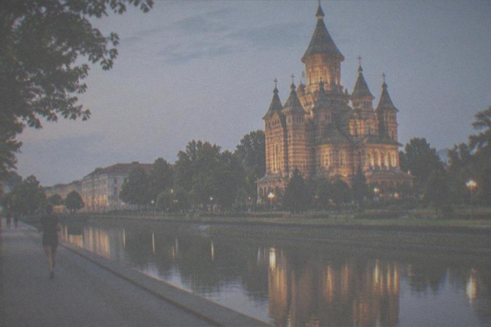 Evening lights on the Metropolitan Orthodox Cathedral reflected in the Bega canal
