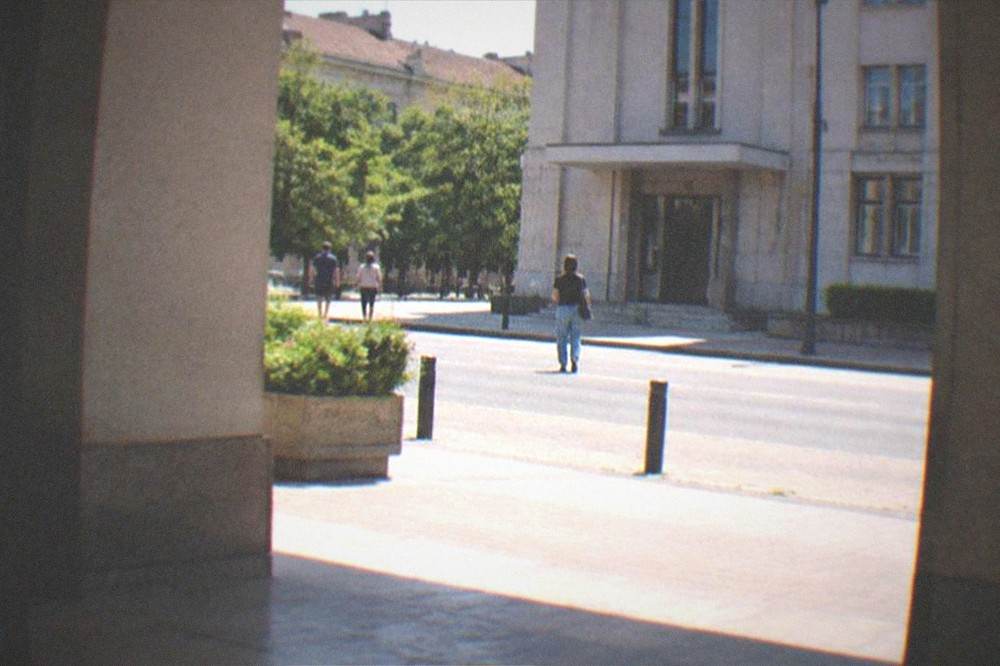 Museum exhibits and archival photographs inside a memorial museum dedicated to the 1989 Revolution