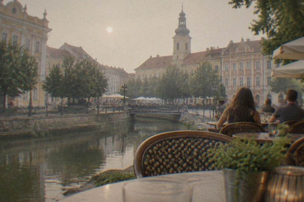 Evening terrace tables on a baroque square in Timisoara