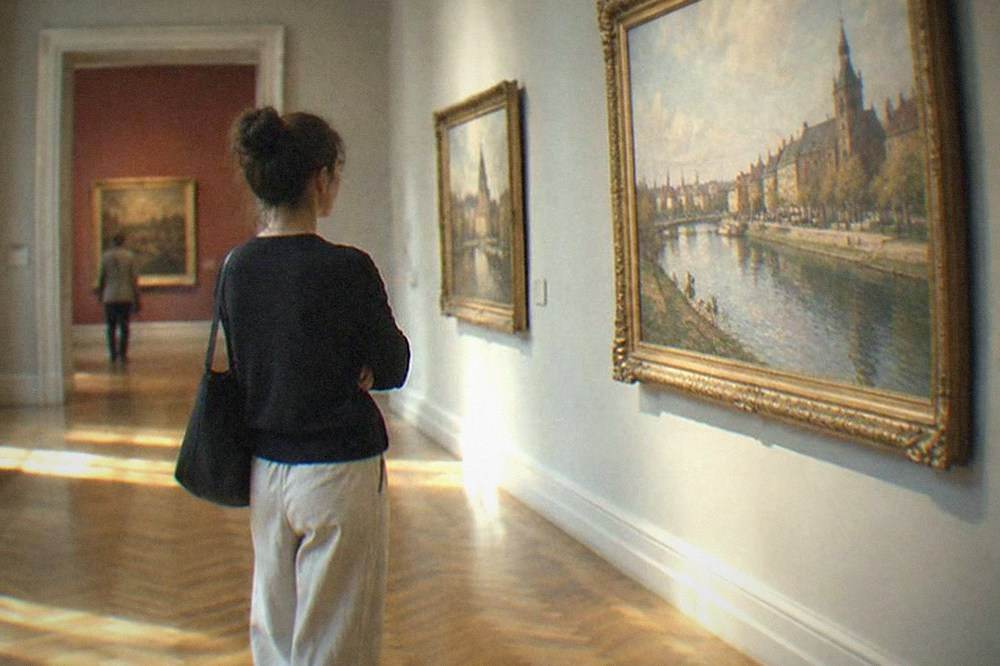 Gallery interior with paintings on display in a Timisoara museum