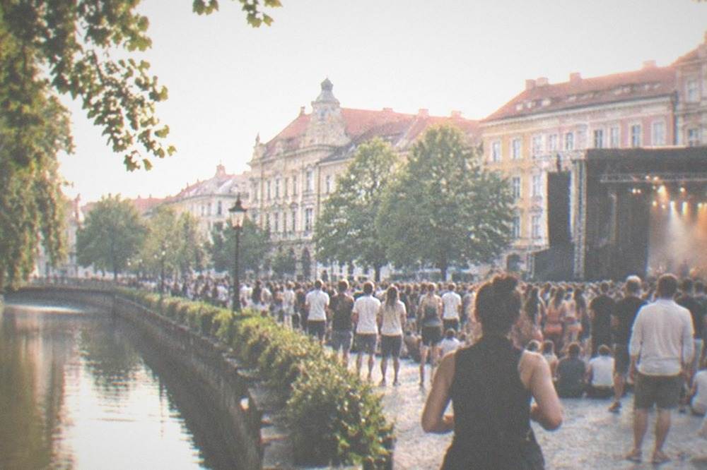 Open-air stage with an evening crowd at a summer festival in Timisoara