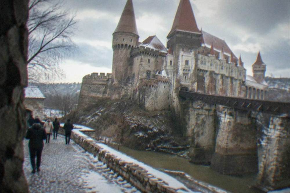 Corvin Castle towers under a grey winter sky in Hunedoara, Romania