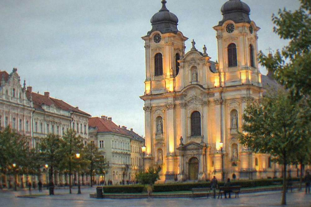 Evening light on a baroque cathedral facade in Timisoara's old town