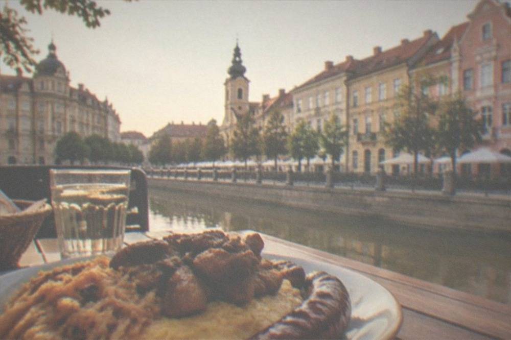 A plate of traditional Banat food on a restaurant table in Timisoara